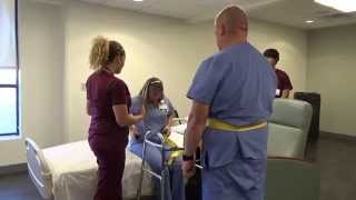 Physical Therapy Transfer Training  How To Transfer From Wheelchair To Bed [upl. by Enaamuj911]